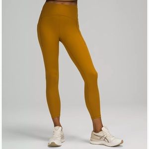 Lululemon power thru leggings 25” size 6. Gold spice color